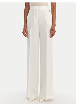 Marciano Guess Spodnie materiałowe 6RGB03 7357A Écru Regular Fit ze sklepu MODIVO w kategorii Spodnie damskie - zdjęcie 188096802