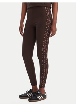 adidas Legginsy Seasonal Essentials Leopard Print KA2793 Brązowy Slim Fit ze sklepu MODIVO w kategorii Spodnie damskie - zdjęcie 188098521