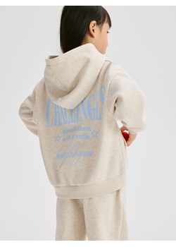 Reserved - Bluza z napisem na plecach - beżowy ze sklepu Reserved w kategorii Bluzy dziewczęce - zdjęcie 188104314