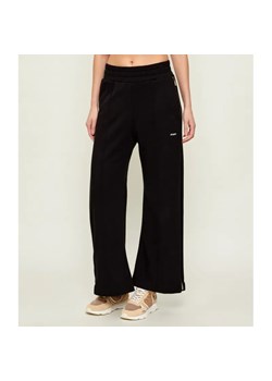 Pinko Spodnie dresowe PARTENZA | flare fit ze sklepu Gomez Fashion Store w kategorii Spodnie damskie - zdjęcie 188108762