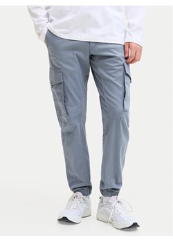 Jack & Jones Spodnie materiałowe Paul Flake 12139912 Niebieski Regular Fit ze sklepu MODIVO w kategorii Spodnie męskie - zdjęcie 188115111