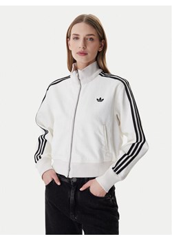 adidas Bluza Firebird KD2892 Beżowy Regular Fit ze sklepu MODIVO w kategorii Bluzy damskie - zdjęcie 188118432
