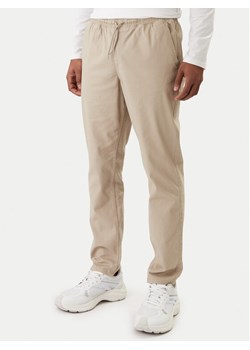 Jack & Jones Joggery Stace Dylan 12288472 Brązowy Regular Fit ze sklepu MODIVO w kategorii Spodnie męskie - zdjęcie 188118450