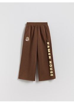 Reserved - Spodnie dresowe Pusheen - ciemnobrązowy ze sklepu Reserved w kategorii Spodnie dziewczęce - zdjęcie 188119860