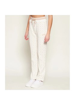 GUESS ACTIVE Spodnie dresowe | Loose fit ze sklepu Gomez Fashion Store w kategorii Spodnie damskie - zdjęcie 188138940