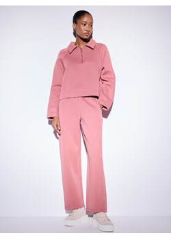 Mohito - Różowe spodnie dresowe - różowy ze sklepu Mohito w kategorii Spodnie damskie - zdjęcie 188141730
