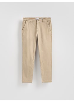 Reserved - Spodnie chino slim fit - beżowy ze sklepu Reserved w kategorii Spodnie męskie - zdjęcie 188143653