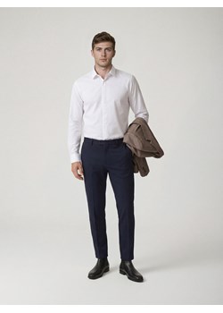 Reserved - Spodnie chino slim fit - granatowy ze sklepu Reserved w kategorii Spodnie męskie - zdjęcie 188155233