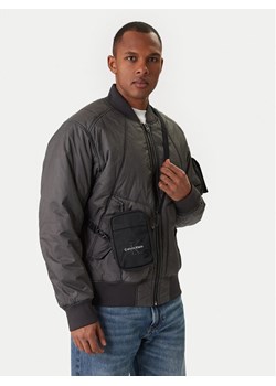 Saszetka Calvin Klein Bold Logo Nylon Slim Reporter LV04D3231G Czarny ze sklepu eobuwie.pl w kategorii Saszetki - zdjęcie 188250844