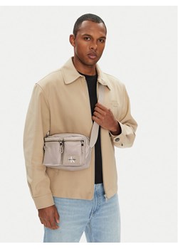 Calvin Klein Saszetka Tech Utility Camera Bag LV04G3178G Écru ze sklepu MODIVO w kategorii Torby męskie - zdjęcie 188255430