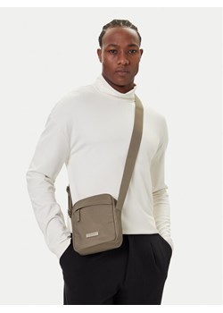 Calvin Klein Saszetka Sleek Reporter LV04D3180G Beżowy ze sklepu MODIVO w kategorii Torby męskie - zdjęcie 188255662