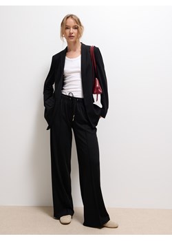 Mohito - Czarne spodnie dresowe - czarny ze sklepu Mohito w kategorii Spodnie damskie - zdjęcie 188328363