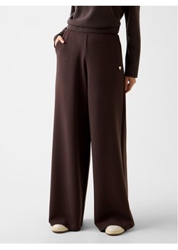 Guess Spodnie materiałowe 166071 Brązowy Slim Fit ze sklepu MODIVO w kategorii Spodnie damskie - zdjęcie 188329721