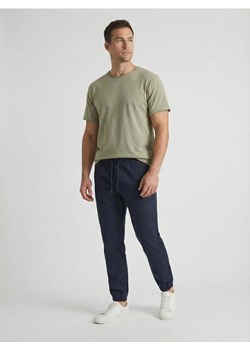 Sinsay - Bawełniane spodnie jogger - granatowy ze sklepu Sinsay w kategorii Spodnie męskie - zdjęcie 188339762