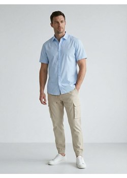 Sinsay - Spodnie jogger cargo - beżowy ze sklepu Sinsay w kategorii Spodnie męskie - zdjęcie 188339764