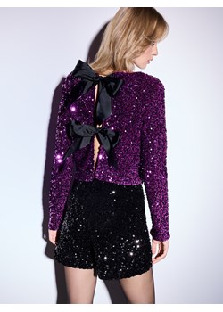 Mohito - Cekinowa fioletowa bluzka z kokardkami - fuksjowy ze sklepu Mohito w kategorii Bluzki damskie - zdjęcie 188374653