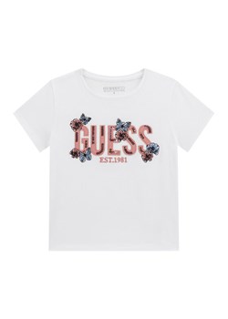 Guess T-Shirt J6RI34 K6YW4 Biały Regular Fit ze sklepu MODIVO w kategorii Bluzki dziewczęce - zdjęcie 188401483
