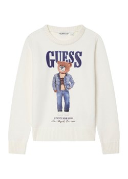 Guess Sweter L6RR04 Z2ZK2 Écru Regular Fit ze sklepu MODIVO w kategorii Swetry chłopięce - zdjęcie 188401511