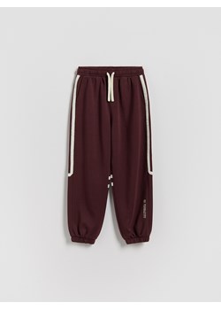 Reserved - Bawełniane spodnie - bordowy ze sklepu Reserved w kategorii Spodnie chłopięce - zdjęcie 188404401