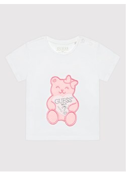 Guess T-Shirt K2RI27 K6YW1 Biały Regular Fit ze sklepu MODIVO w kategorii Koszulki niemowlęce - zdjęcie 188406604