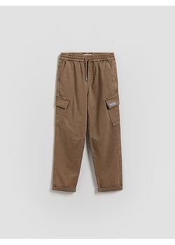 Reserved - Elastyczne spodnie - beżowy ze sklepu Reserved w kategorii Spodnie chłopięce - zdjęcie 188413634