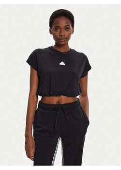 adidas T-Shirt City Escape IQ4830 Czarny Loose Fit ze sklepu MODIVO w kategorii Bluzki damskie - zdjęcie 188419041