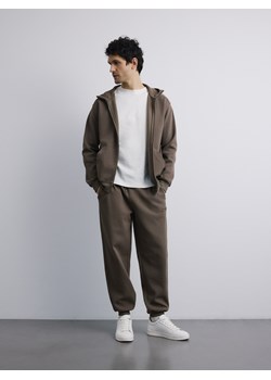 Reserved - Spodnie dresowe comfort fit - jasny zielony ze sklepu Reserved w kategorii Spodnie męskie - zdjęcie 188428424