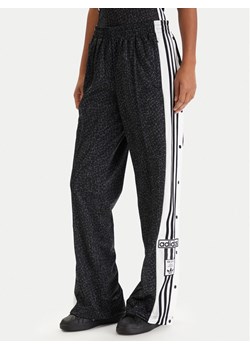 adidas Spodnie dresowe Adibreak KD2830 Czarny Loose Fit ze sklepu MODIVO w kategorii Spodnie damskie - zdjęcie 188432013