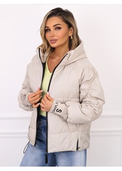KURTKA Z OZDOBNYMI PRZESZYCIAMI NA RĘKAWACH I PRZEDŁUŻANYM ŚCIĄGACZEM- JASNOBEŻOWA ze sklepu olika.com.pl w kategorii Kurtki damskie - zdjęcie 188432310