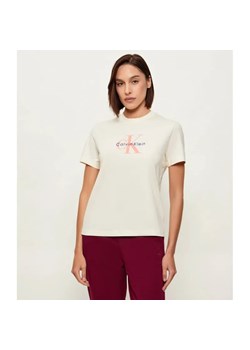 Calvin Klein Jeans T-shirt HERO | Regular Fit ze sklepu Gomez Fashion Store w kategorii Bluzki damskie - zdjęcie 188434831