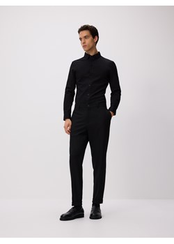 Reserved - Spodnie garniturowe z kantem - czarny ze sklepu Reserved w kategorii Spodnie męskie - zdjęcie 188436570