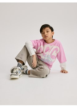 Reserved - Bawełniane spodnie - jasnoszary ze sklepu Reserved w kategorii Spodnie chłopięce - zdjęcie 188460732