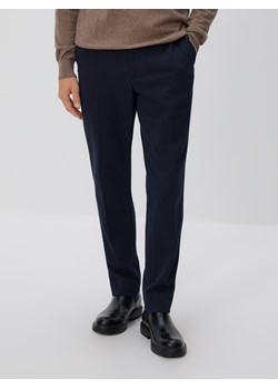 Reserved - Spodnie garniturowe slim fit - granatowy ze sklepu Reserved w kategorii Spodnie męskie - zdjęcie 188476253