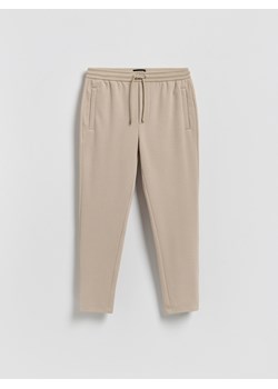 Reserved - Spodnie dresowe slim - beżowy ze sklepu Reserved w kategorii Spodnie męskie - zdjęcie 188502490