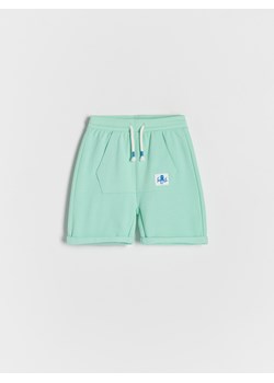 Reserved - Bawełniane szorty z kieszenią - jasnoturkusowy ze sklepu Reserved w kategorii Spodenki chłopięce - zdjęcie 188504684