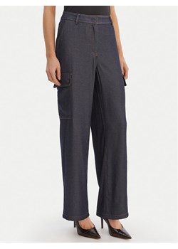 Guess Spodnie materiałowe W6RB65 WL842 Granatowy Regular Fit ze sklepu MODIVO w kategorii Spodnie damskie - zdjęcie 188513520