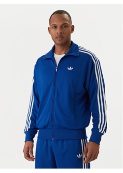 adidas Bluza adicolor Firebird KE0790 Niebieski Loose Fit ze sklepu MODIVO w kategorii Bluzy męskie - zdjęcie 188513833