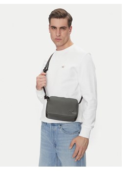 Calvin Klein Jeans Saszetka Cargo Camera Bag LV04G3081G Khaki ze sklepu MODIVO w kategorii Torby męskie - zdjęcie 188514072