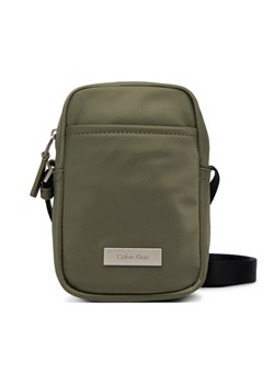 Calvin Klein Saszetka Sleek Slim Reporter LV04D3233G Zielony ze sklepu MODIVO w kategorii Torby męskie - zdjęcie 188514334