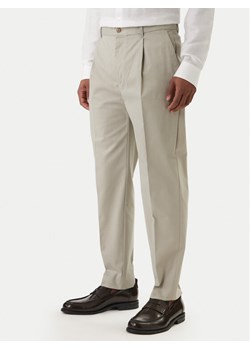 Calvin Klein Chinosy LV04LE612G Beżowy Slim Fit ze sklepu MODIVO w kategorii Spodnie męskie - zdjęcie 188514503