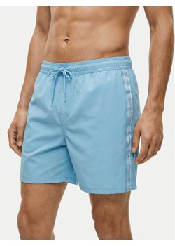 Calvin Klein Swimwear Szorty kąpielowe LV00N61002 Błękitny Regular Fit ze sklepu MODIVO w kategorii Kąpielówki - zdjęcie 188514603