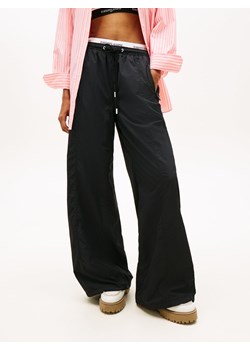 Tommy Jeans Męskie spodnie do biegania Mężczyźni Sztuczne włókno czarny jednolity ze sklepu vangraaf w kategorii Spodnie męskie - zdjęcie 188531792