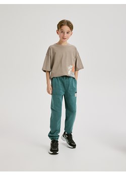 Reserved - Joggery z efektem sprania - morski ze sklepu Reserved w kategorii Spodnie chłopięce - zdjęcie 188536611