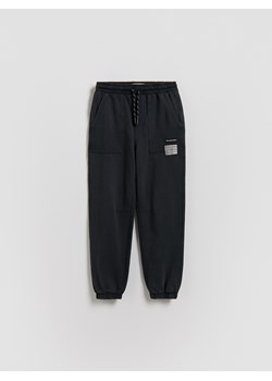 Reserved - Joggery z efektem sprania - czarny ze sklepu Reserved w kategorii Spodnie chłopięce - zdjęcie 188536620
