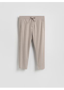 Reserved - Spodnie joggery - beżowy ze sklepu Reserved w kategorii Spodnie męskie - zdjęcie 188537261