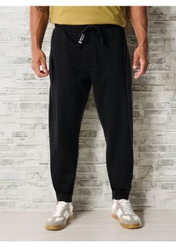 Sinsay - Spodnie dresowe jogger - czarny ze sklepu Sinsay w kategorii Spodnie męskie - zdjęcie 188542510