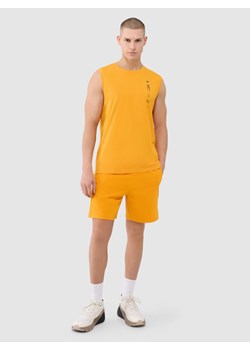 Męskie spodenki dresowe 4F 4FRSS25TSHOM696 - żółte ze sklepu Sportstylestory.com w kategorii Spodenki męskie - zdjęcie 188544234