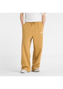 Spodnie męskie New Balance MB61M77EABG – pomarańczowe ze sklepu New Balance Poland w kategorii Spodnie męskie - zdjęcie 188549310