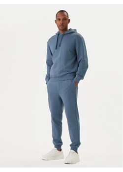 HUGO Dres Dapodayote 50492581 Niebieski Relaxed Fit ze sklepu MODIVO w kategorii Dresy męskie - zdjęcie 188632231