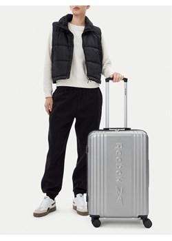 Reebok Walizka średnia CEOWB-RBK-WAL-003-07-CCC-M Srebrny ze sklepu MODIVO w kategorii Walizki - zdjęcie 188632280
